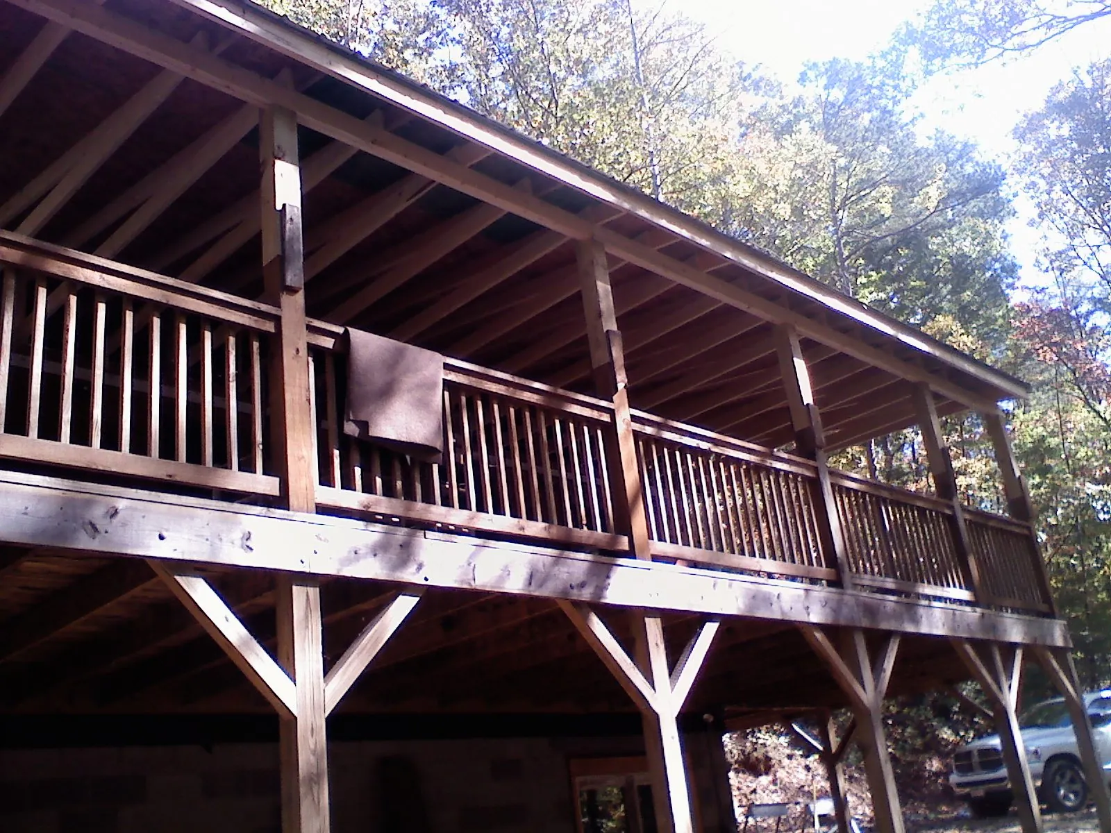 Timber framing under a new elevated porch and deck — Roof Leak Repair in Saint Louisville by Roofing Brothers